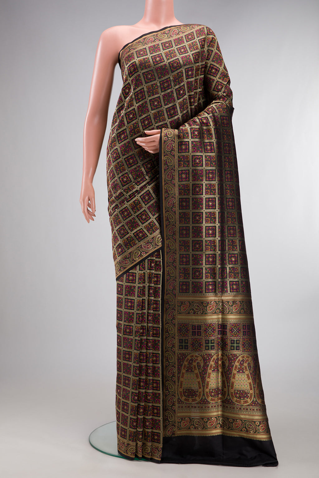 Pure Silk Black Banarasi Jamavar Saree with Zari Brocade on the body and Fancy Border.  displayed on a mannequin