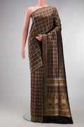 Pure Silk Black Banarasi Jamavar Saree with Zari Brocade on the body and Fancy Border.  displayed on a mannequin