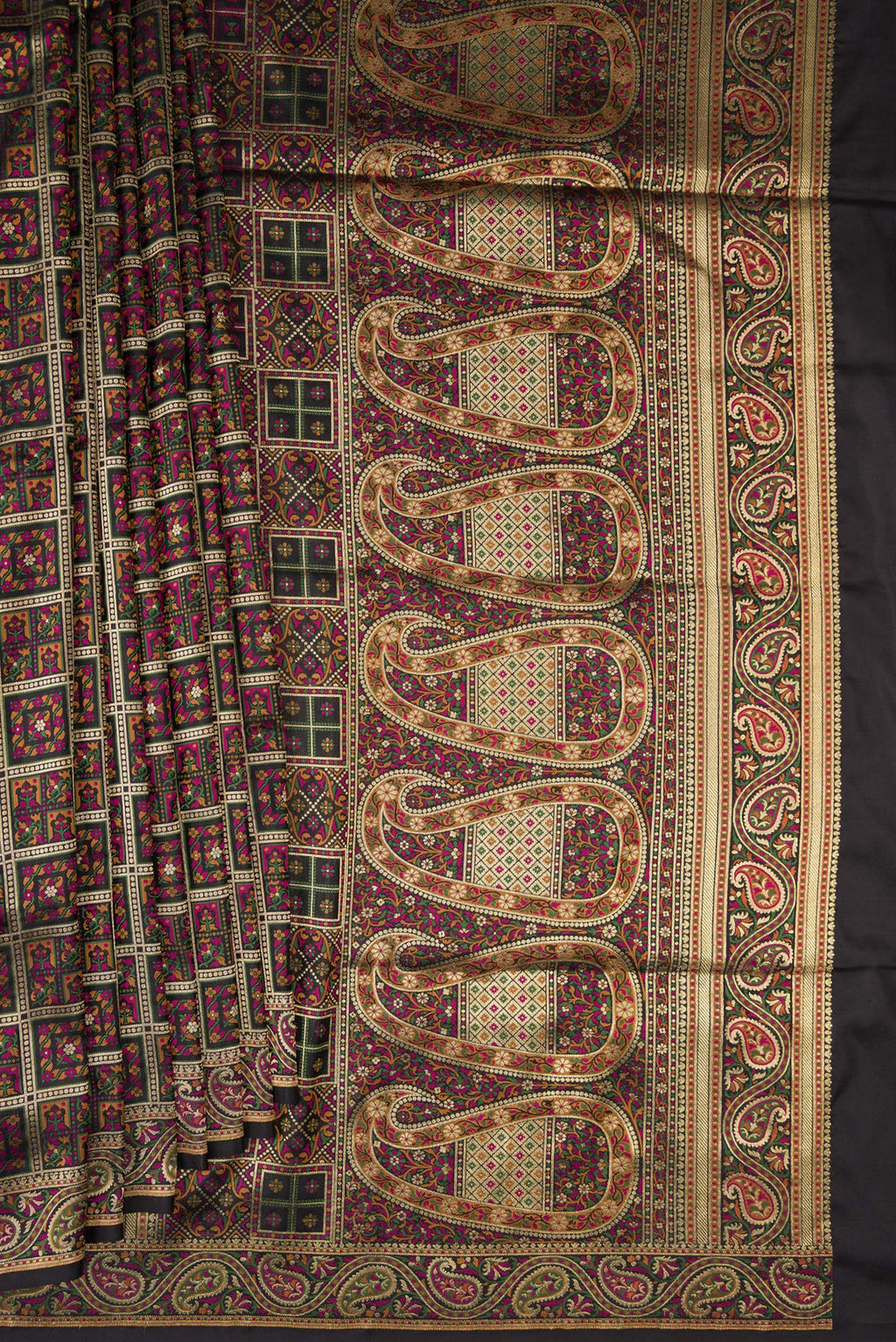 Pleats and pallu of Pure Silk Black Banarasi Jamavar Saree with Zari Brocade on the body and Fancy Border. 