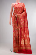 Pure Silk Red Banarasi Jamavar Saree with Zari Brocade on the body and Zari And Thread Border.  displayed on a mannequin