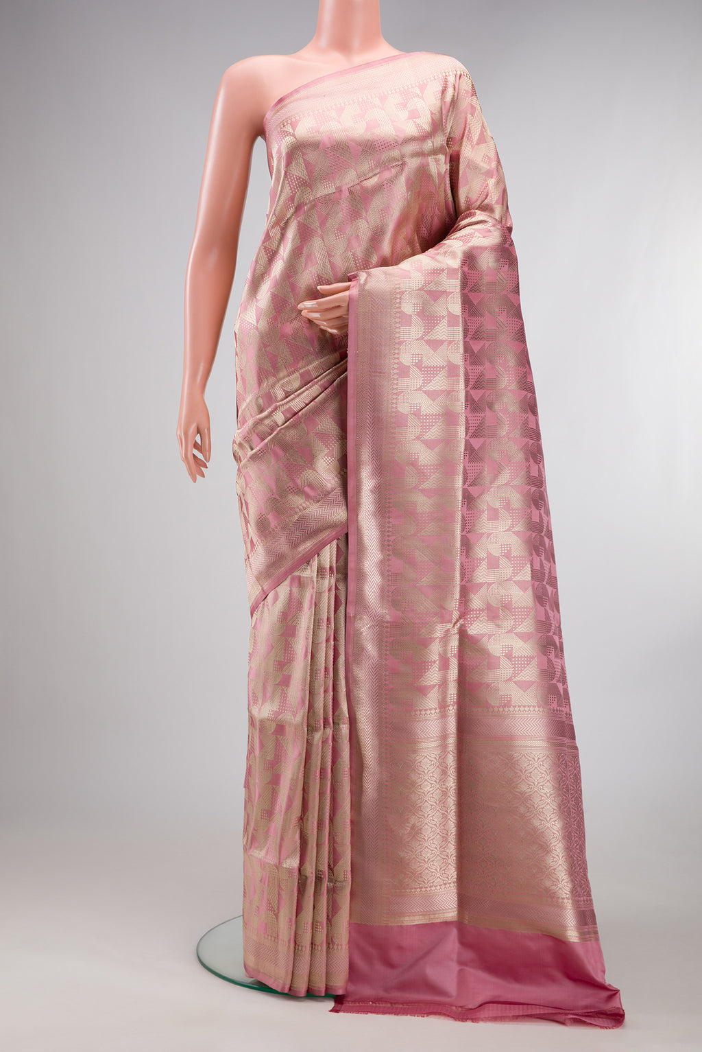 Pure Silk Rose Gold Dual Tone Banarasi Saree with Zari Brocade on the body and Fancy Border.  displayed on a mannequin