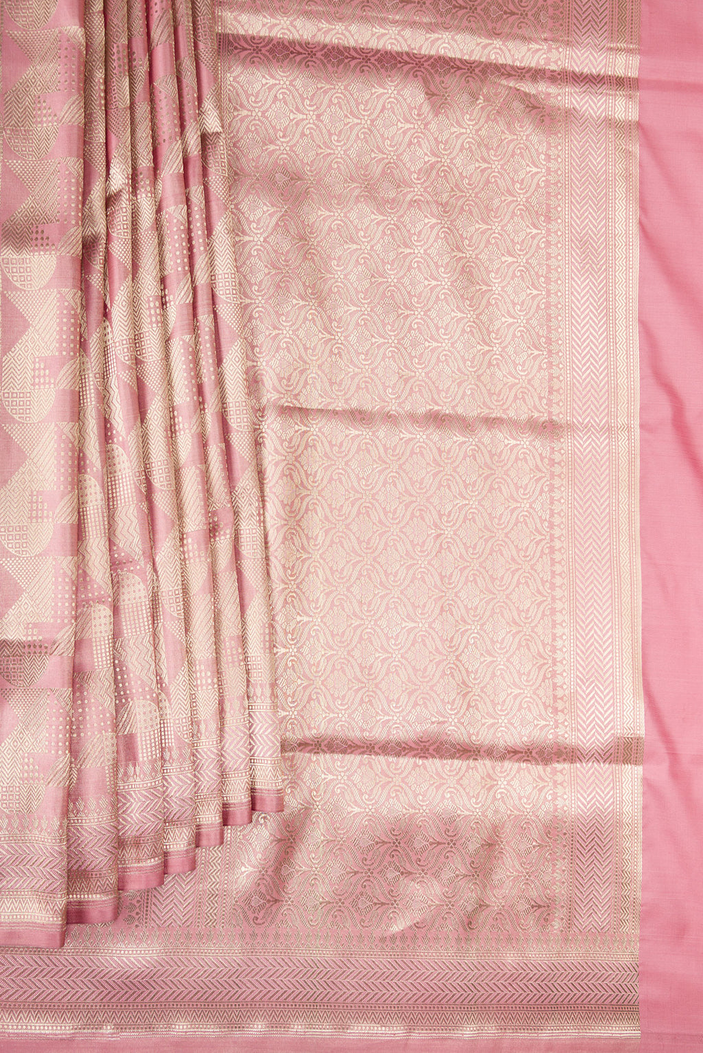 Pleats and pallu of Pure Silk Rose Gold Dual Tone Banarasi Saree with Zari Brocade on the body and Fancy Border. 