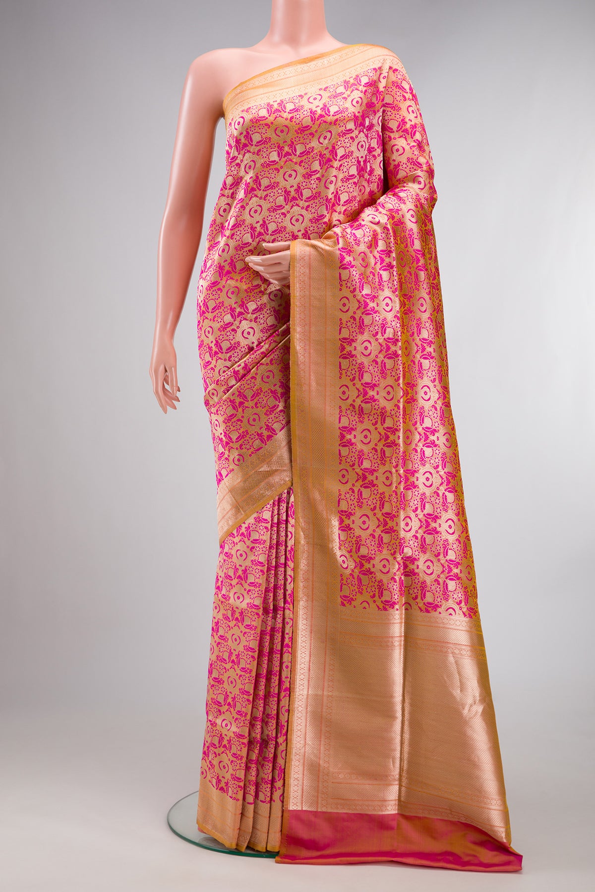 Pure Silk Pink Dual Tone Banarasi Saree with Jacquard design on the body and Zari Border.  displayed on a mannequin