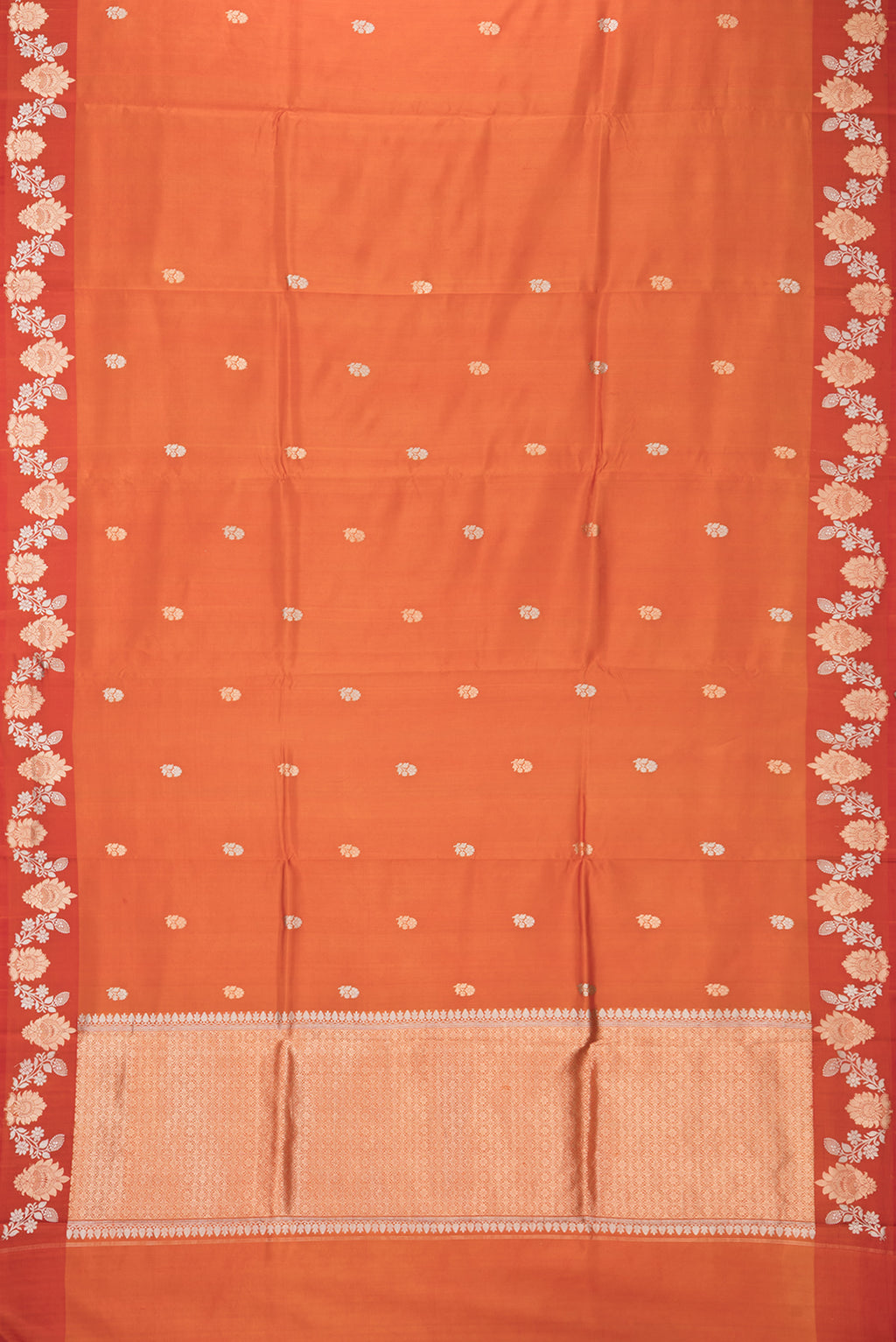 Flat view of Pure Silk Orange Dual Tone Tussar Saree with Zari Butta on the body and Fancy Border. 