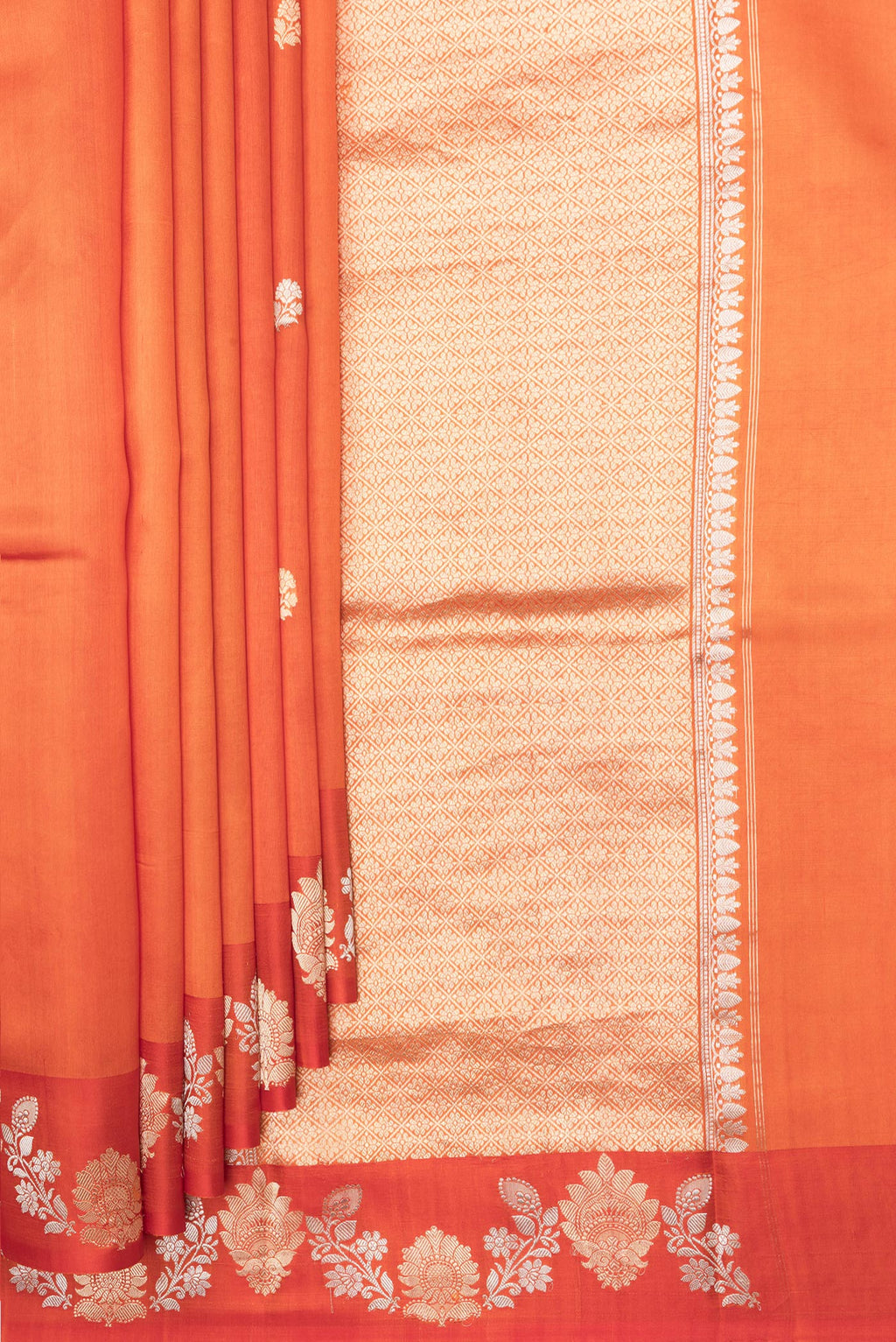 Pleats and pallu of Pure Silk Orange Dual Tone Tussar Saree with Zari Butta on the body and Fancy Border. 
