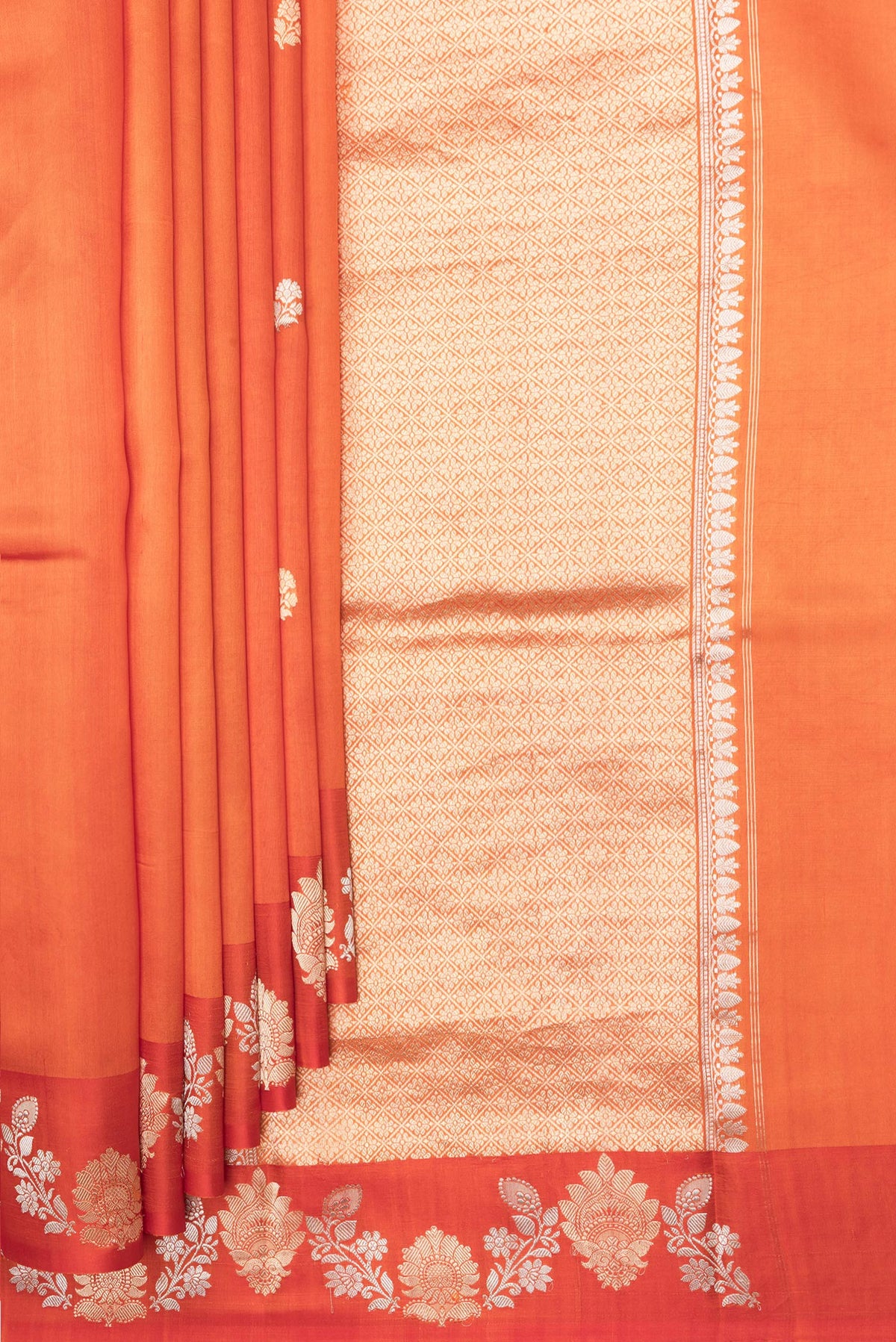 Pleats and pallu of Pure Silk Orange Dual Tone Tussar Saree with Zari Butta on the body and Fancy Border. 