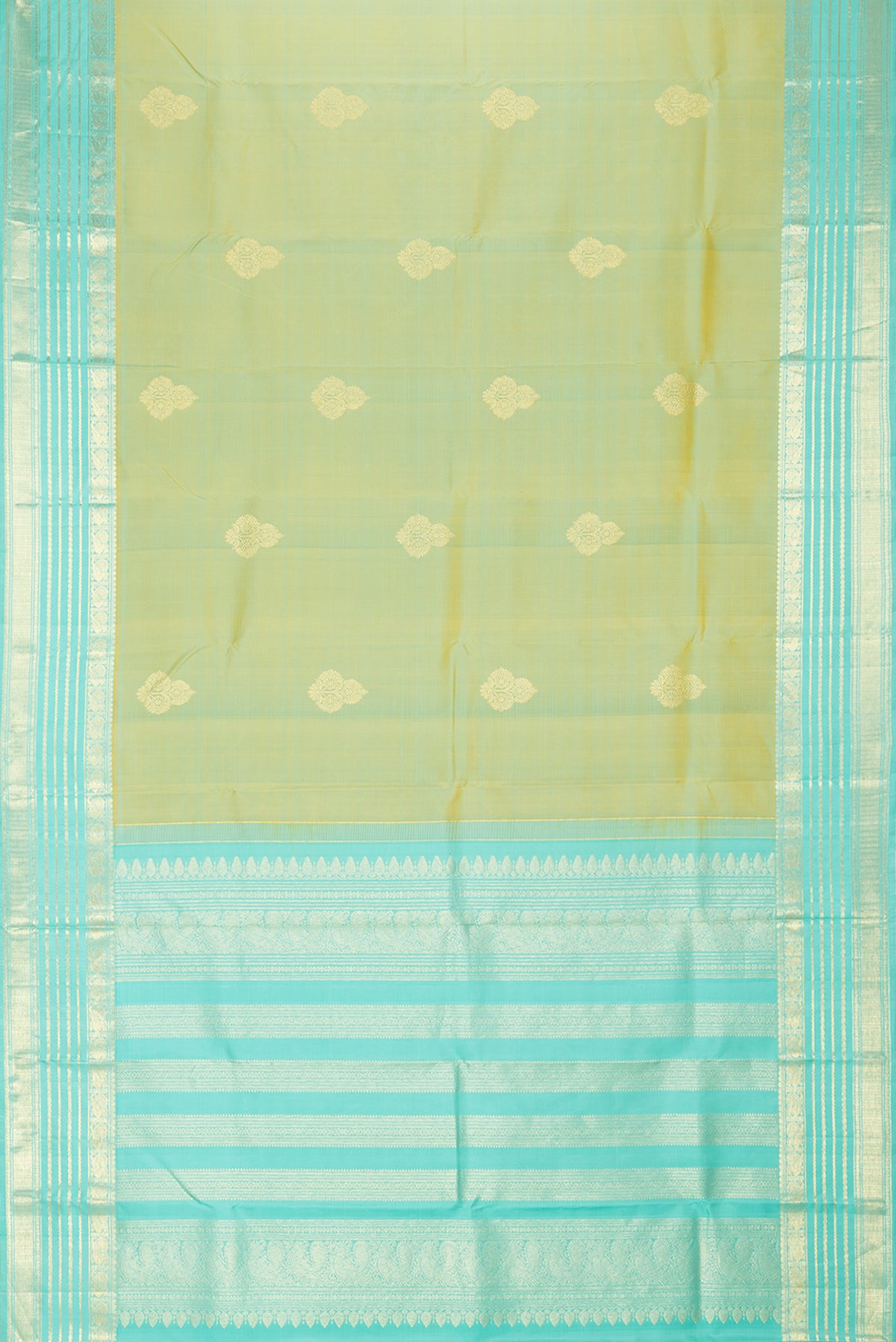 Flat view of Pure Silk Pista Green Dual Tone Kanchipuram Saree with Zari Butta on the body and Zari Border. 