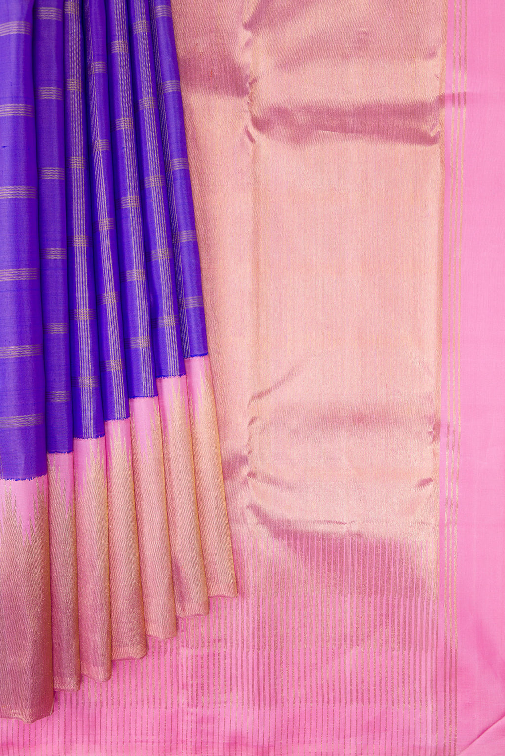Pleats and pallu of Pure Silk Pure Zari Lavender Kanjivaram Saree with Checked design on the body and Zari Border. 
