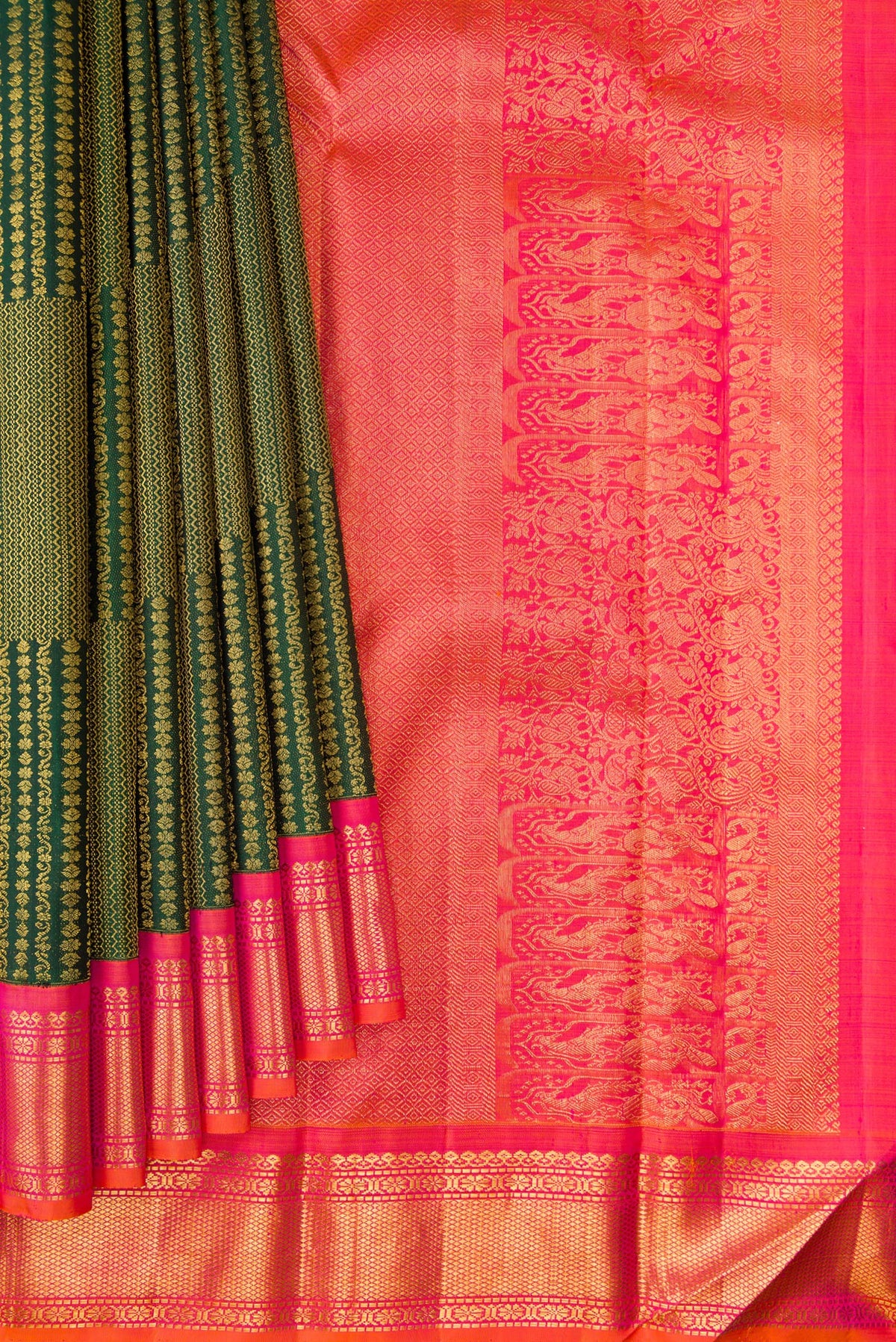 Pleats and pallu of Pure Silk Bottle Green Kanchipuram Saree with Zari Brocade on the body and Zari Border. 