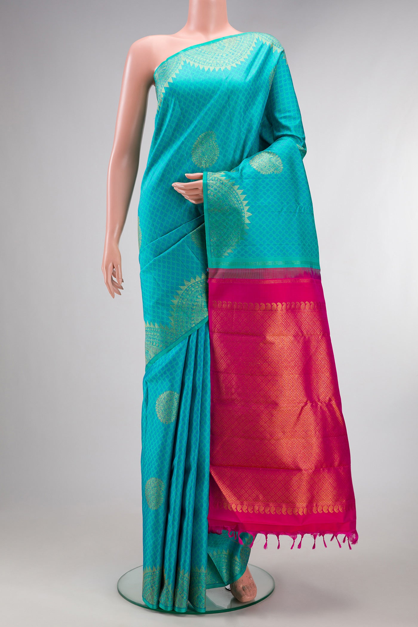 Pure Silk Sky Blue Kanchipuram Saree with Jacquard With Zari Butta on the body and Fancy Border.  displayed on a mannequin