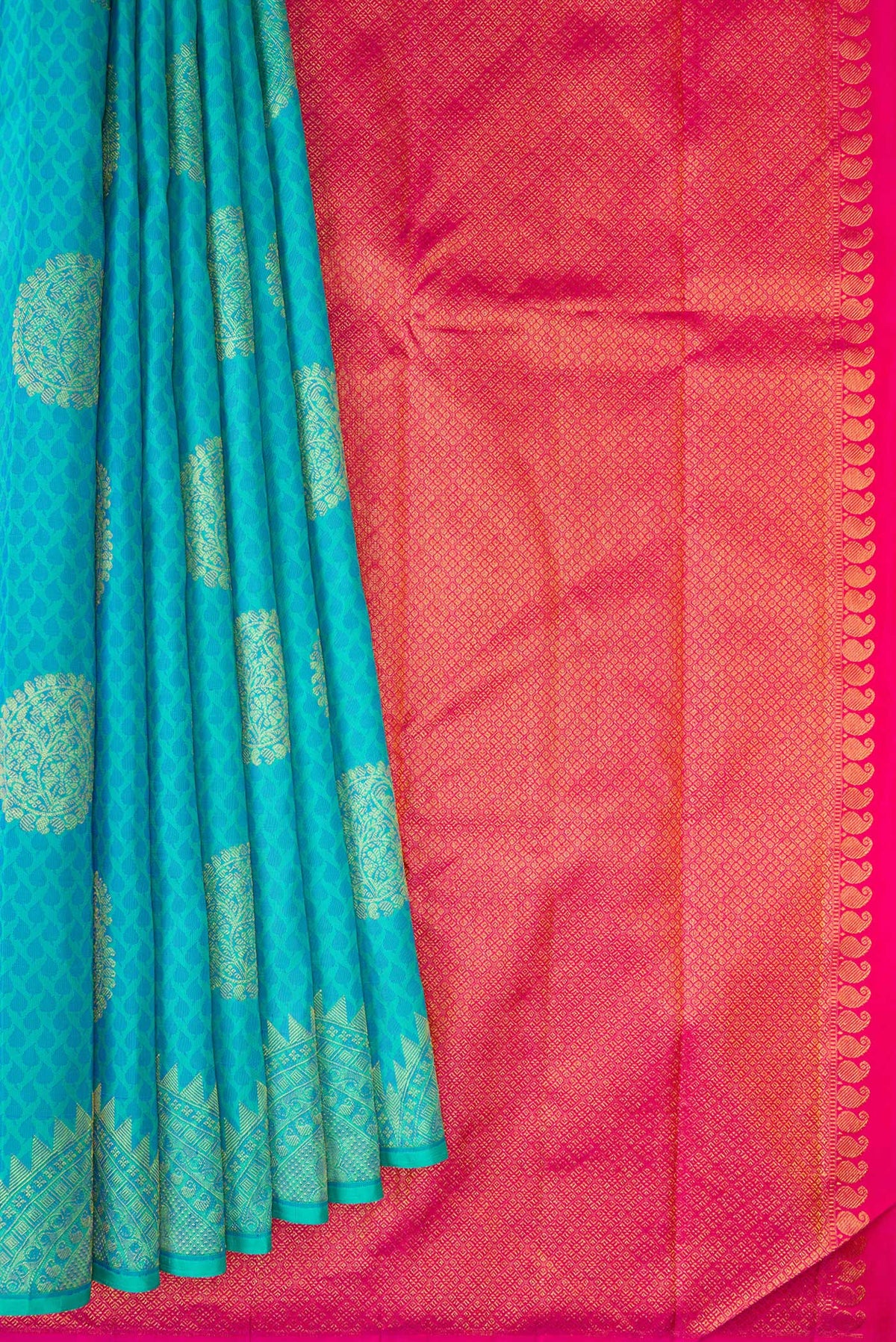 Pleats and pallu of Pure Silk Sky Blue Kanchipuram Saree with Jacquard With Zari Butta on the body and Fancy Border. 