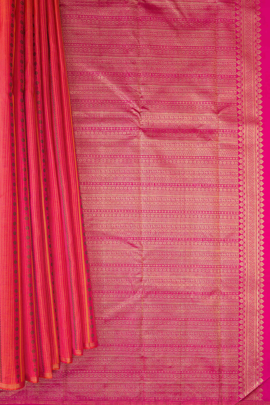 Pleats and pallu of Pure Silk Coral Kanchipuram Saree with Stripes on the body and Thin Zari Line. 