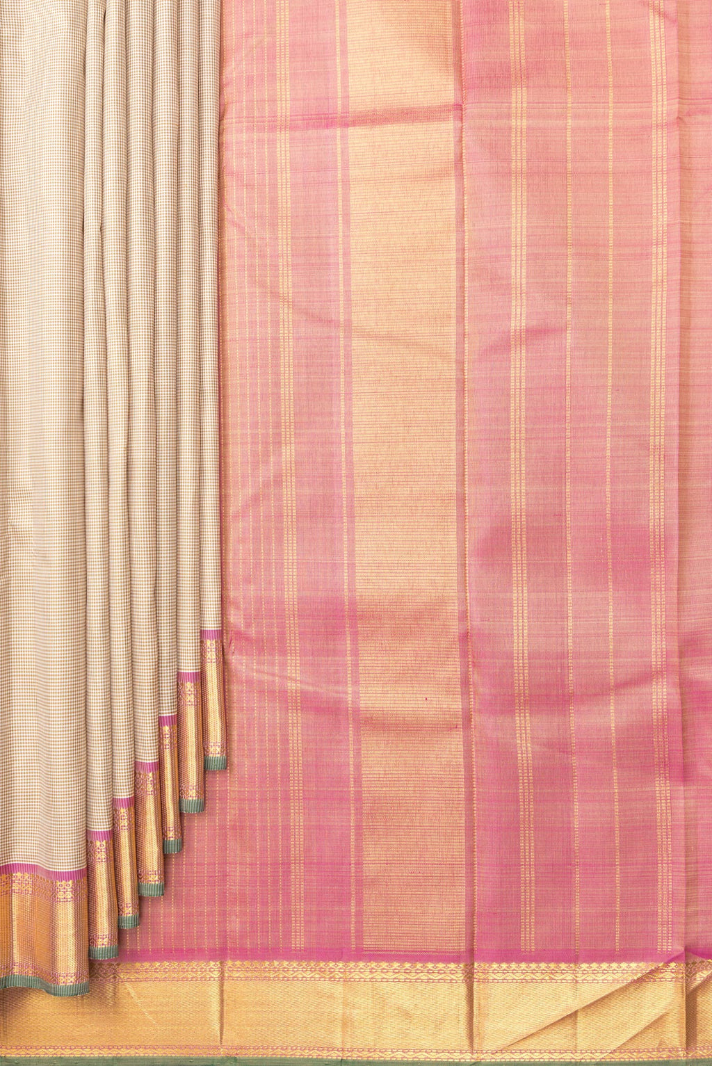 Pleats and pallu of Pure Silk Beige Kanchipuram Saree with Checked design on the body and Zari Border. 