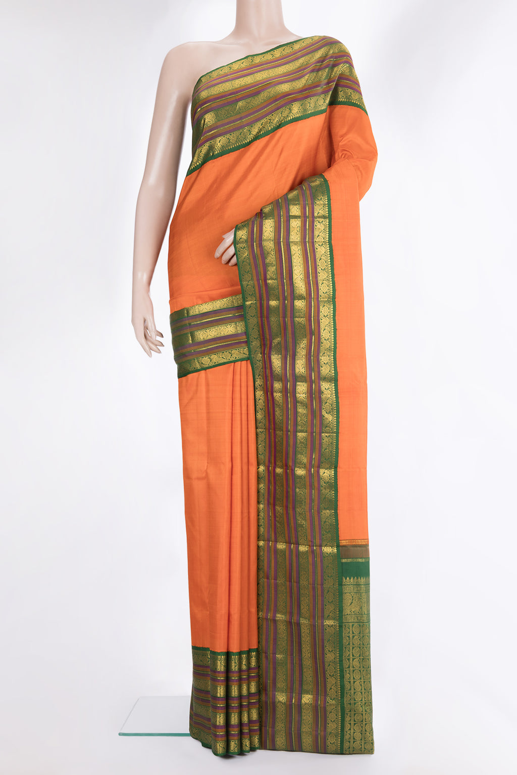 Pure Silk Orange Kanjivaram Saree with Plain Body and Zari Border.  displayed on a mannequin