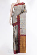 Pure Silk Grey Dual Tone Kanjivaram Saree with Checked design on the body and Zari Border.  displayed on a mannequin
