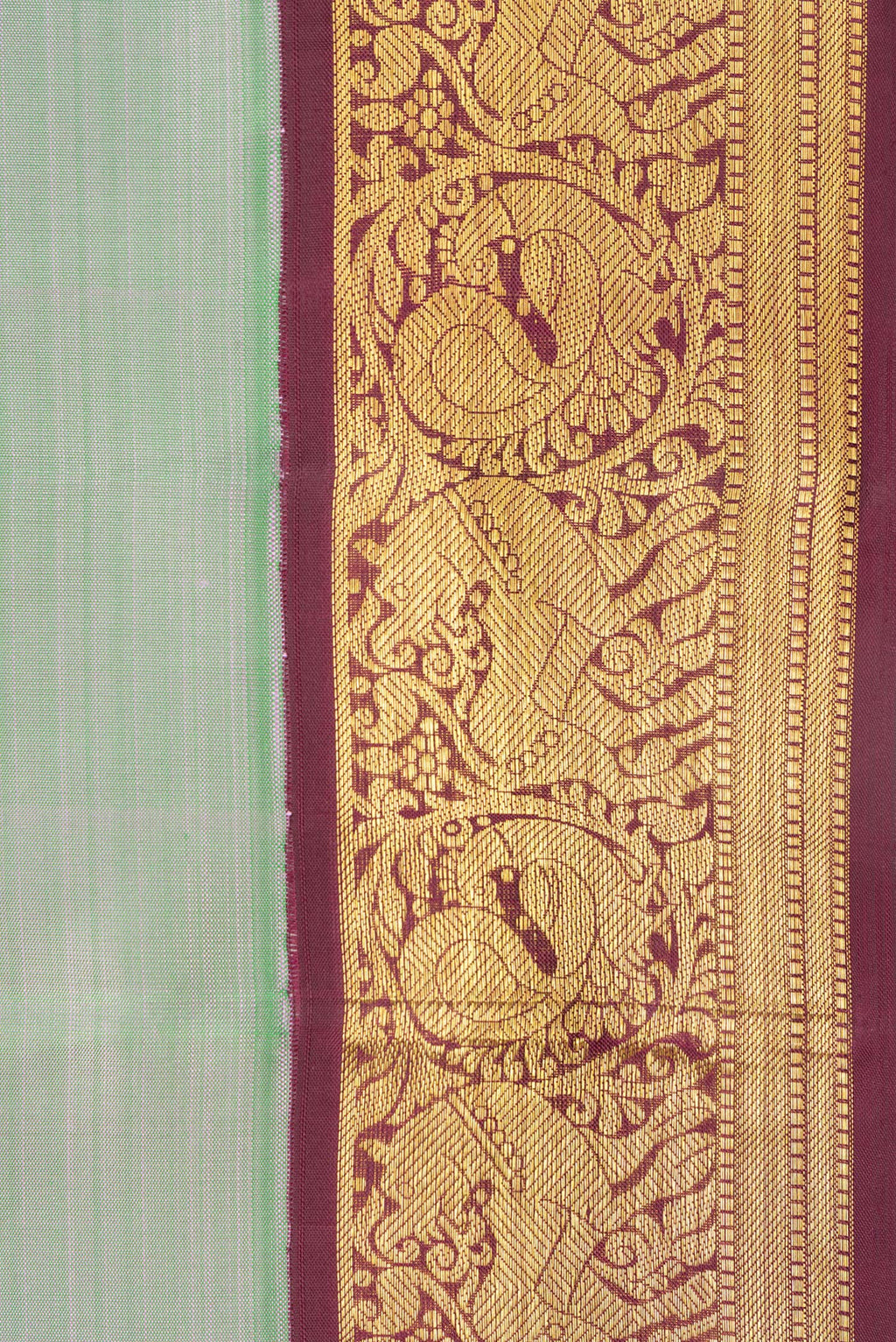 Border image of Pure Silk Pista Green Dual Tone Kanjivaram Saree with Plain Body and Zari Border. 