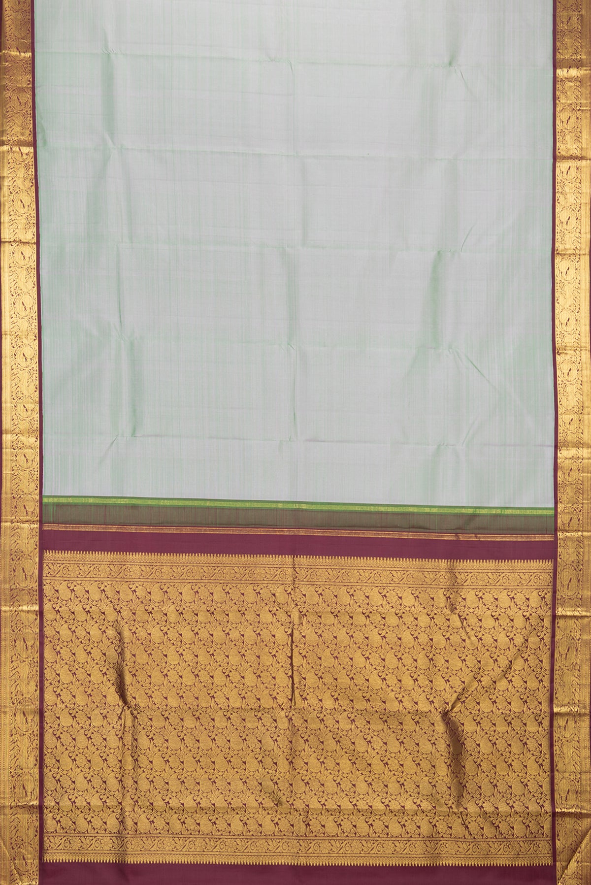 Flat view of Pure Silk Pista Green Dual Tone Kanjivaram Saree with Plain Body and Zari Border. 
