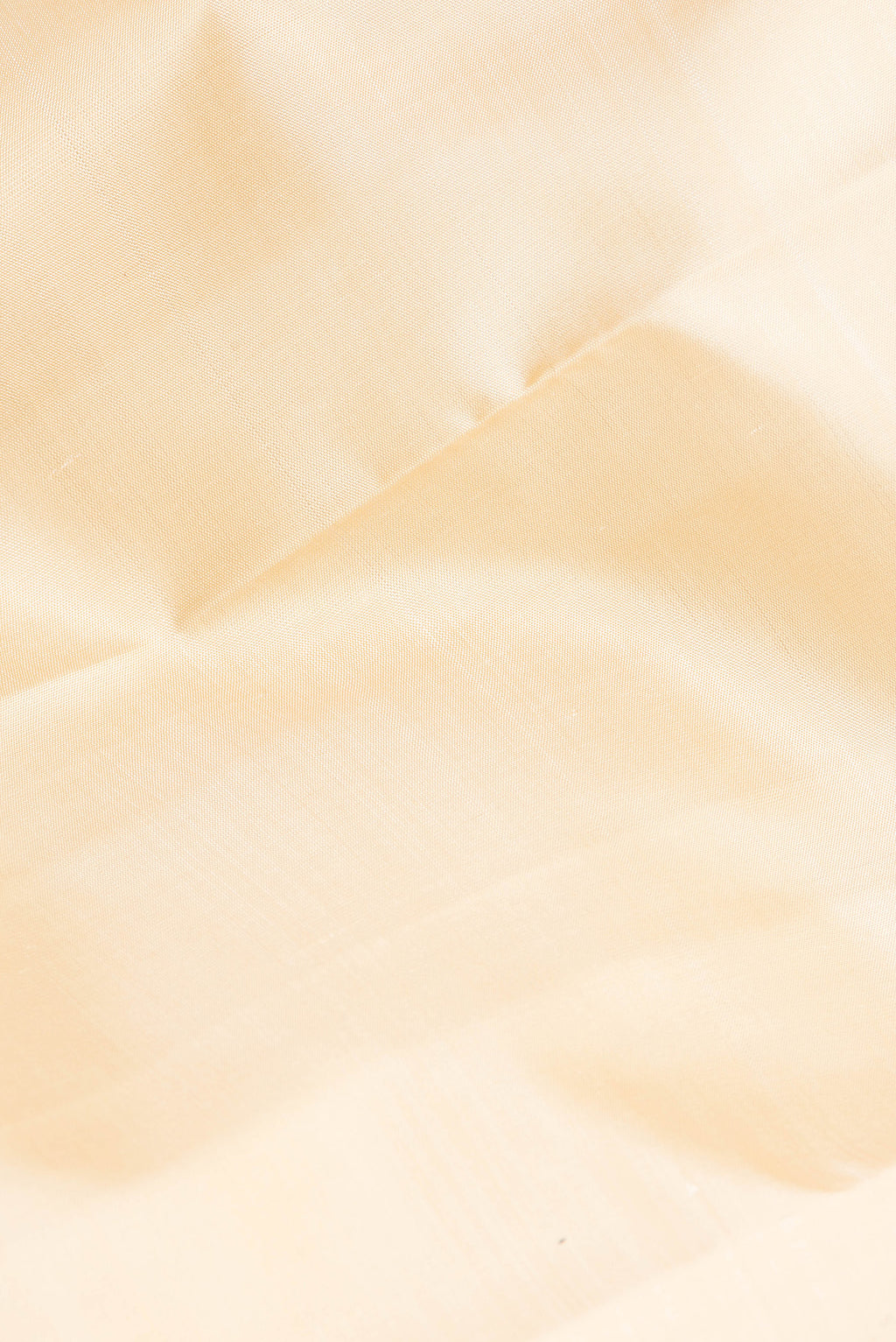 Close up of Pure Silk Sandal Dual Tone Kanjivaram Saree with Plain Body and Zari Border.  displaying folds
