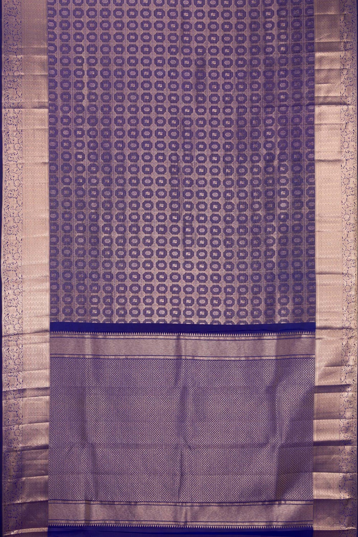 Flat view of Pure Silk Dark Blue Kanchipuram Saree with Zari Brocade on the body and Zari Border. 