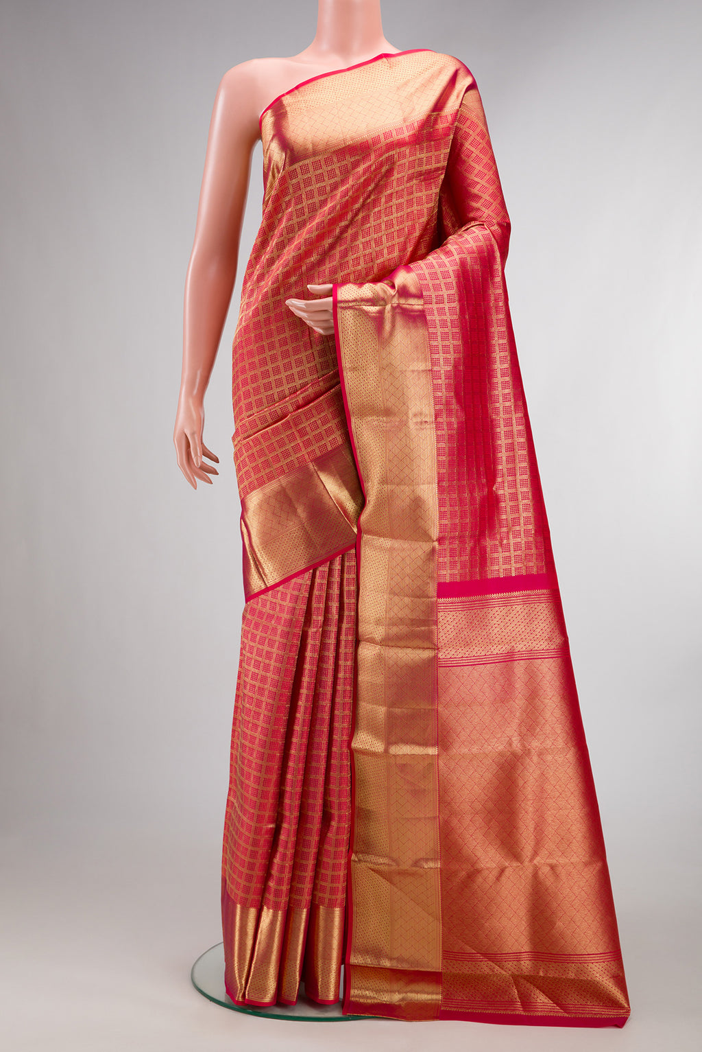 Pure Silk Dark Pink Dual Tone Kanchipuram Saree with Zari Brocade on the body and Zari Border.  displayed on a mannequin