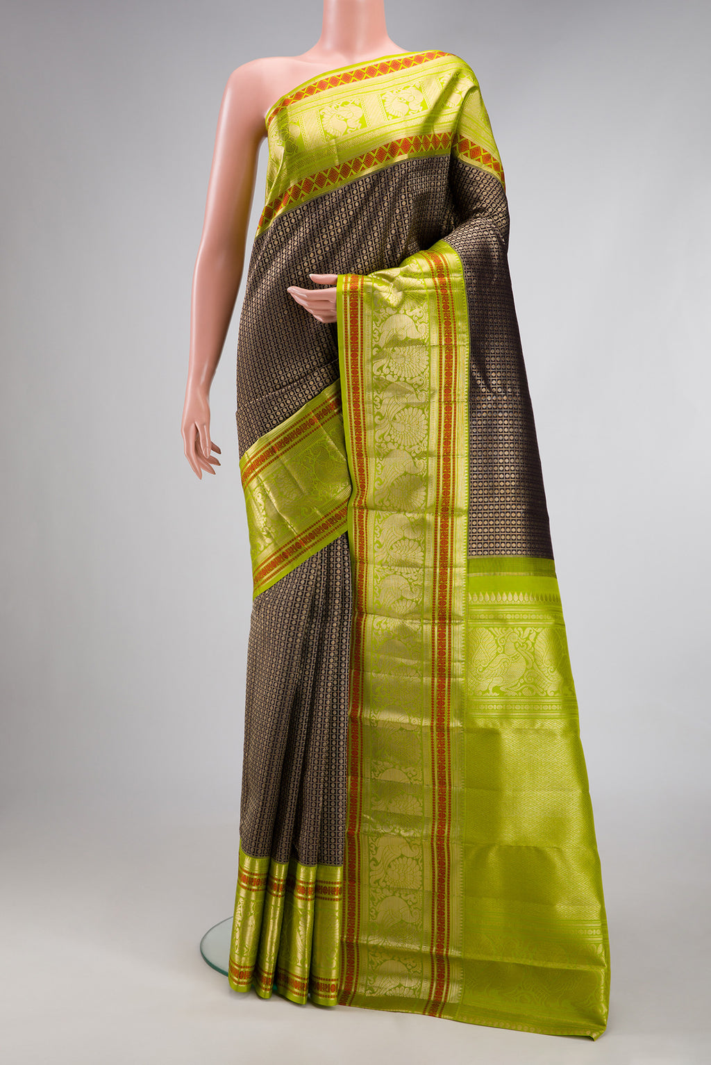 Coffee Brown Kanchipuram Silk Saree with Zari Brocade on the body and Zari Border.  displayed on a mannequin