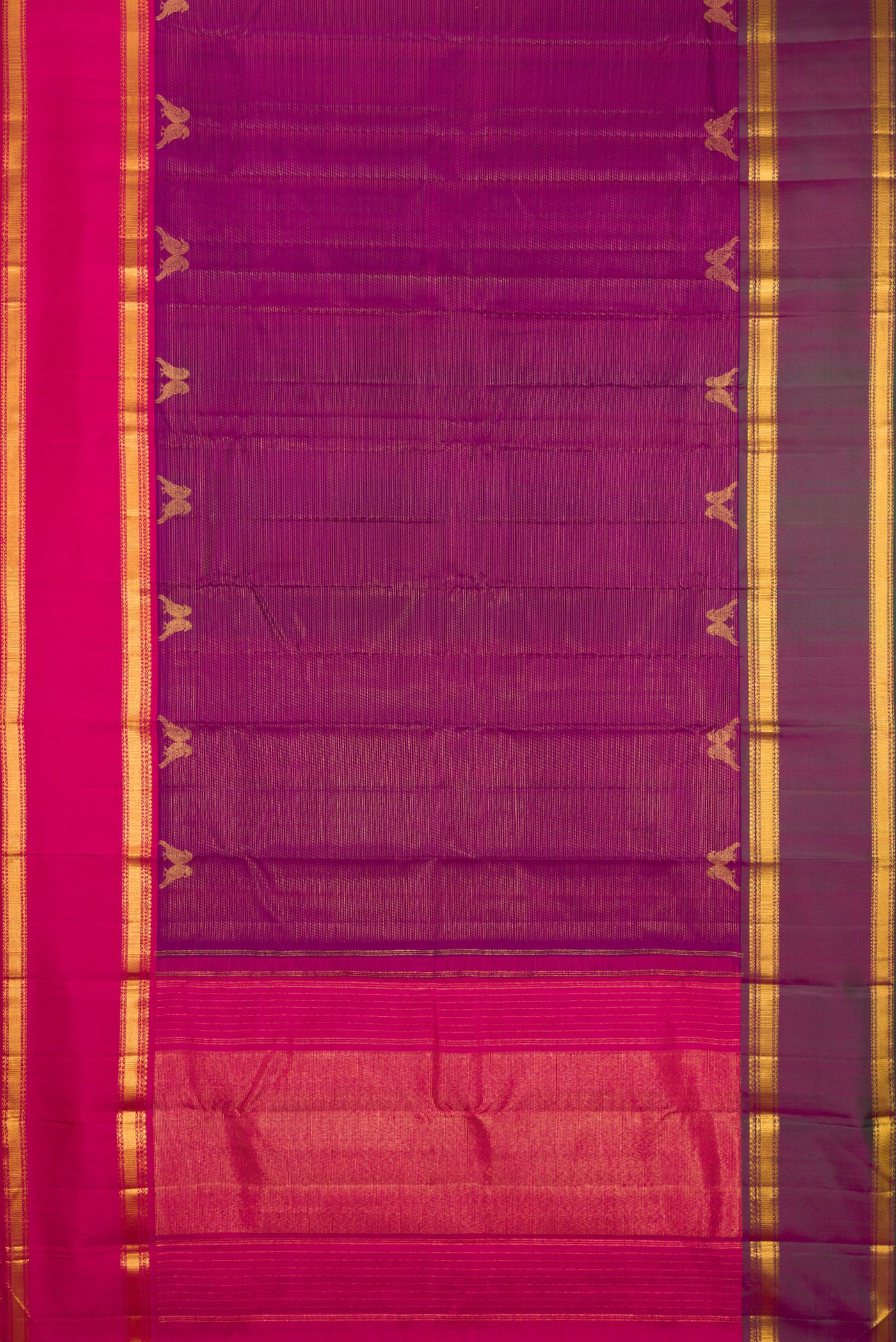 Flat view of Magenta Kanjivaram Silk Saree with Stripes on the body and Ganga Jamuna Border. 