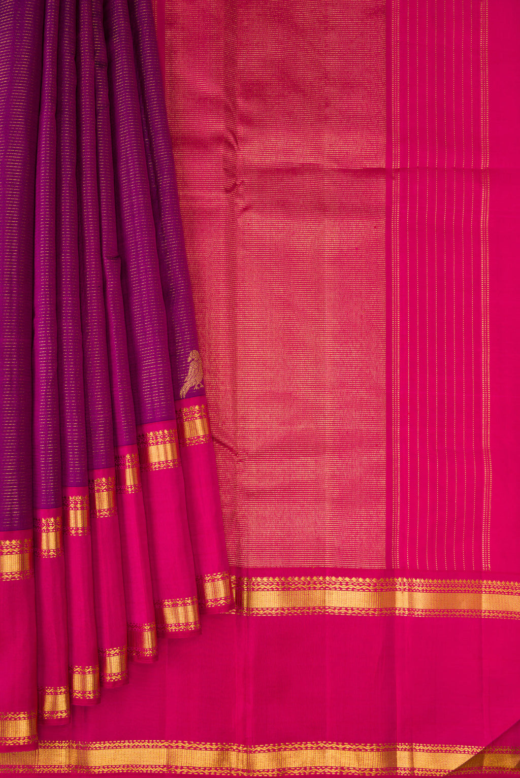 Pleats and pallu of Magenta Kanjivaram Silk Saree with Stripes on the body and Ganga Jamuna Border. 