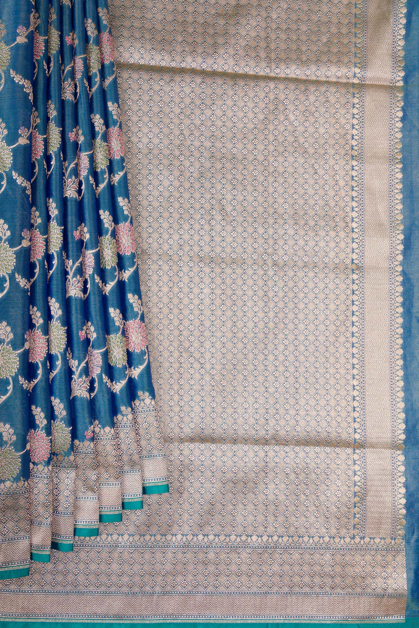 Pleats and pallu of Peacock Blue Dual Tone Banarasi Silk Saree with Zari Brocade on the body and Fancy Border. 