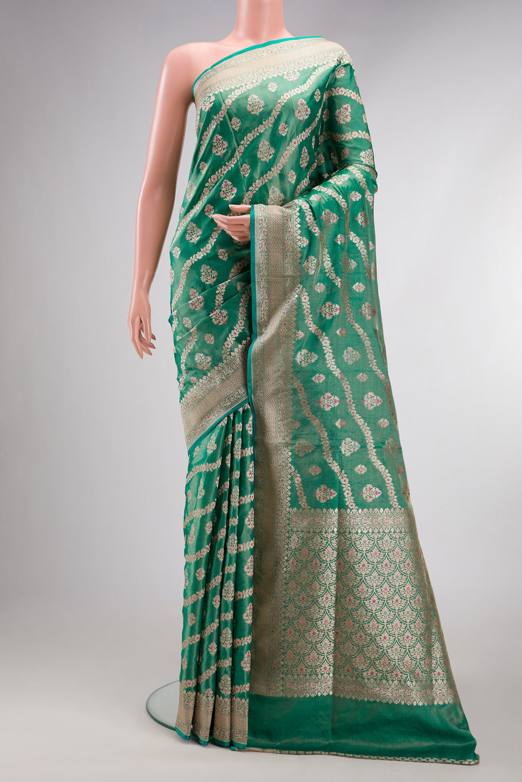 Green Dual Tone Banarasi Silk Saree with Zari Brocade on the body and Fancy Border.  displayed on a mannequin