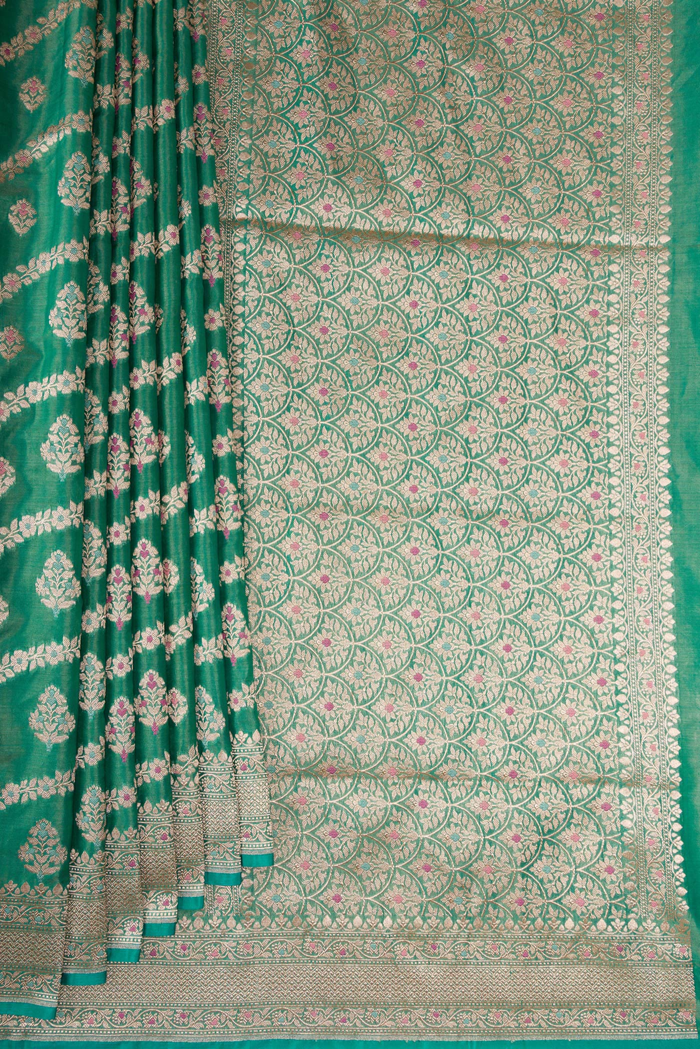 Pleats and pallu of Green Dual Tone Banarasi Silk Saree with Zari Brocade on the body and Fancy Border. 