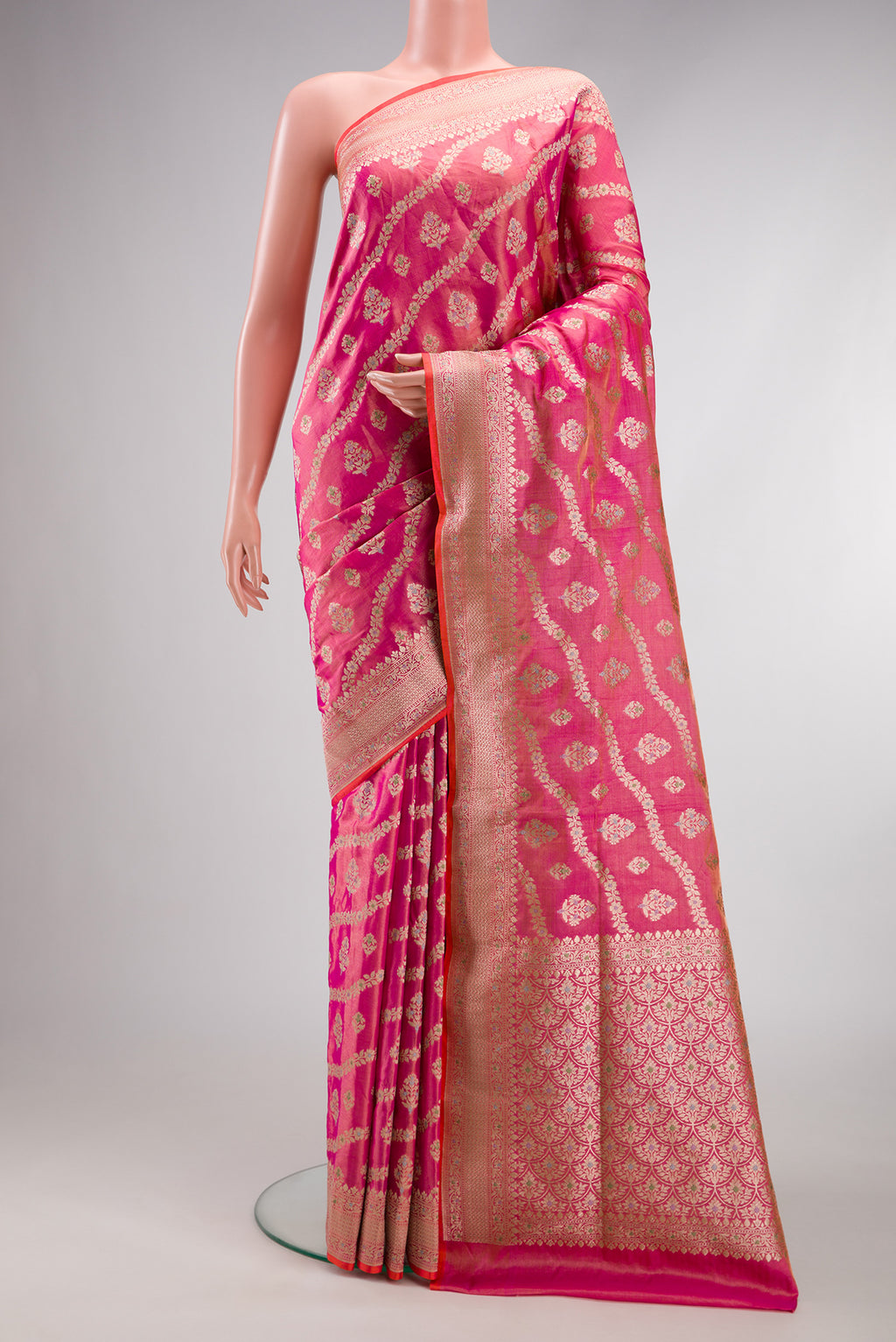 Pink Dual Tone Banarasi Silk Saree with Zari Brocade on the body and Fancy Border.  displayed on a mannequin