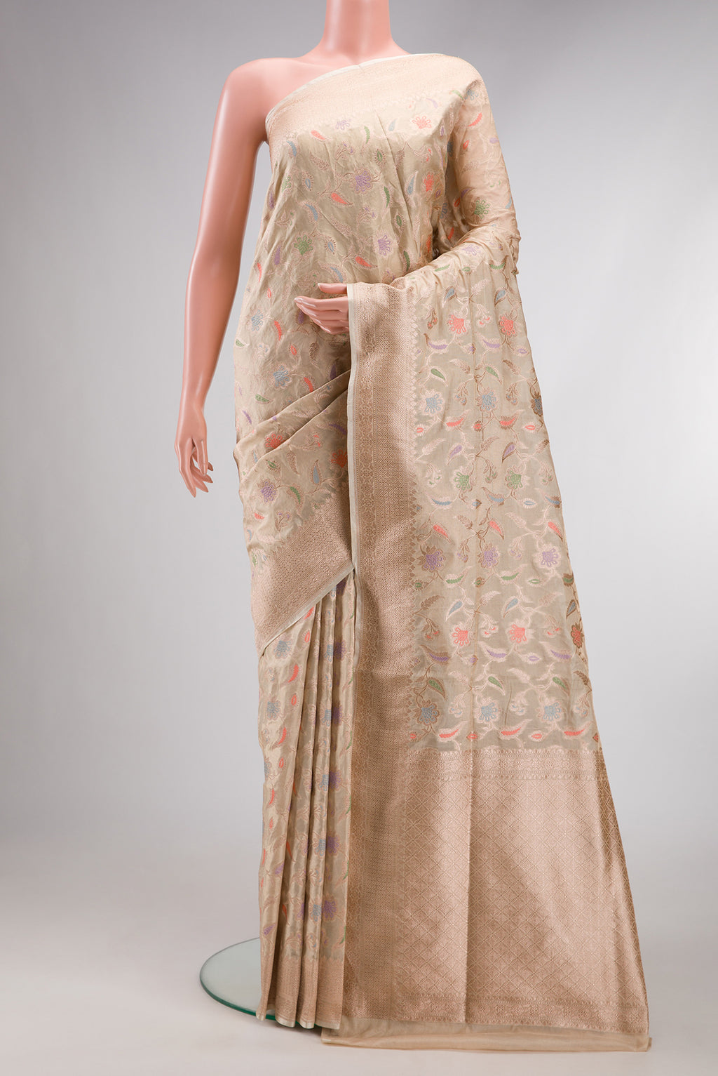 Beige Dual Tone Banarasi Silk Saree with Zari Brocade on the body and Fancy Border.  displayed on a mannequin
