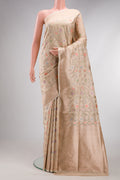 Beige Dual Tone Banarasi Silk Saree with Zari Brocade on the body and Fancy Border.  displayed on a mannequin