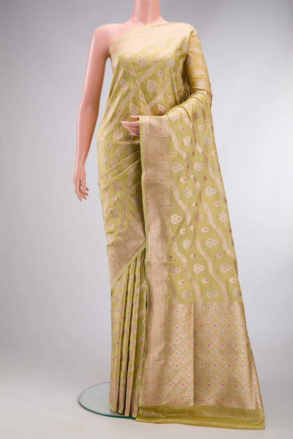 Light Green Dual Tone Banarasi Silk Saree with Zari Brocade on the body and Zari Border.  displayed on a mannequin