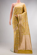Mehandi Green Dual Tone Banarasi Silk Saree with Zari Brocade on the body and Fancy Border.  displayed on a mannequin