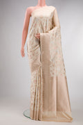 Beige Dual Tone Banarasi Silk Saree with Zari Brocade on the body and Fancy Border.  displayed on a mannequin