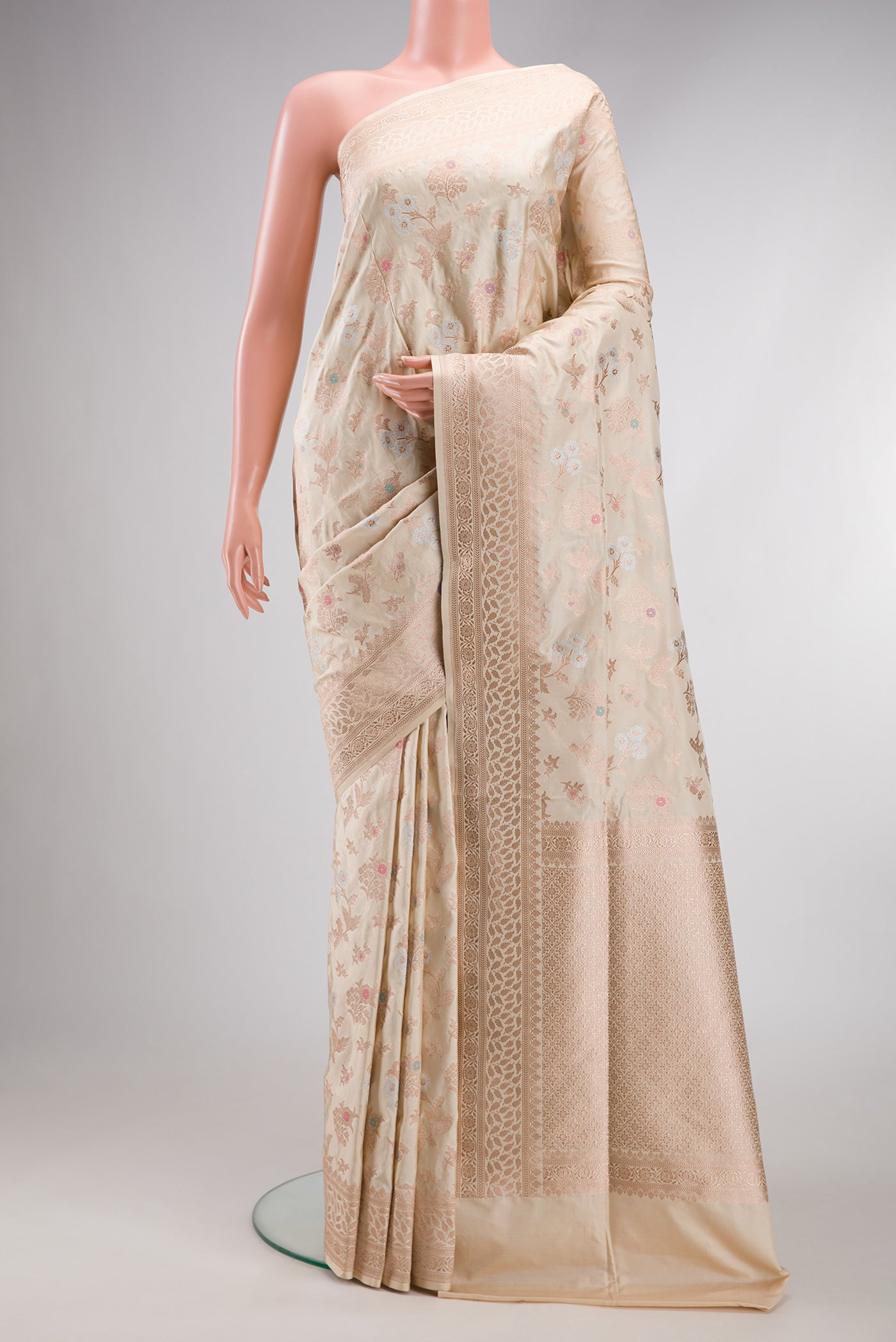 Beige Dual Tone Banarasi Silk Saree with Zari Brocade on the body and Fancy Border.  displayed on a mannequin