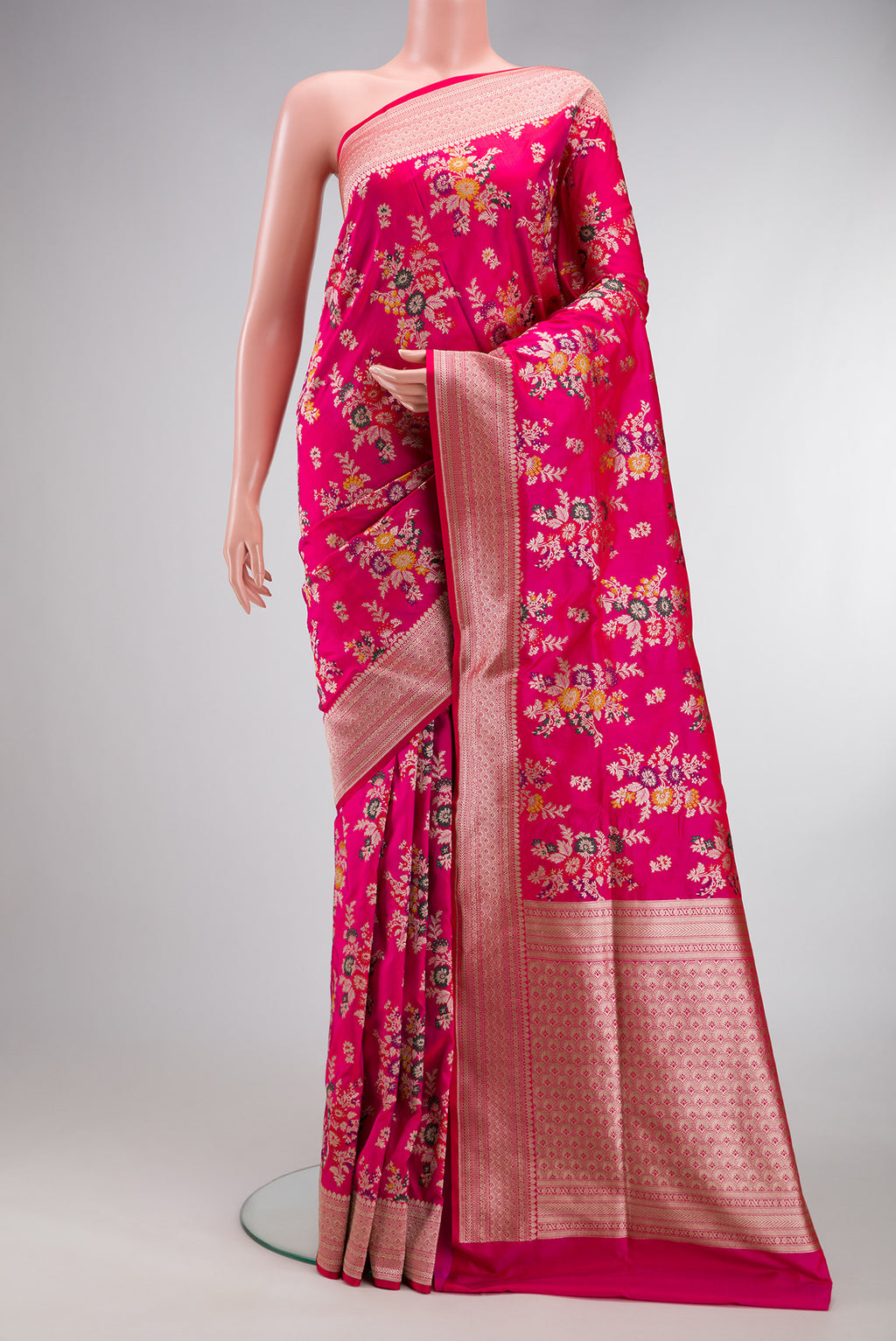 Dark Pink Banarasi Silk Saree with Zari Brocade on the body and Zari Border.  displayed on a mannequin