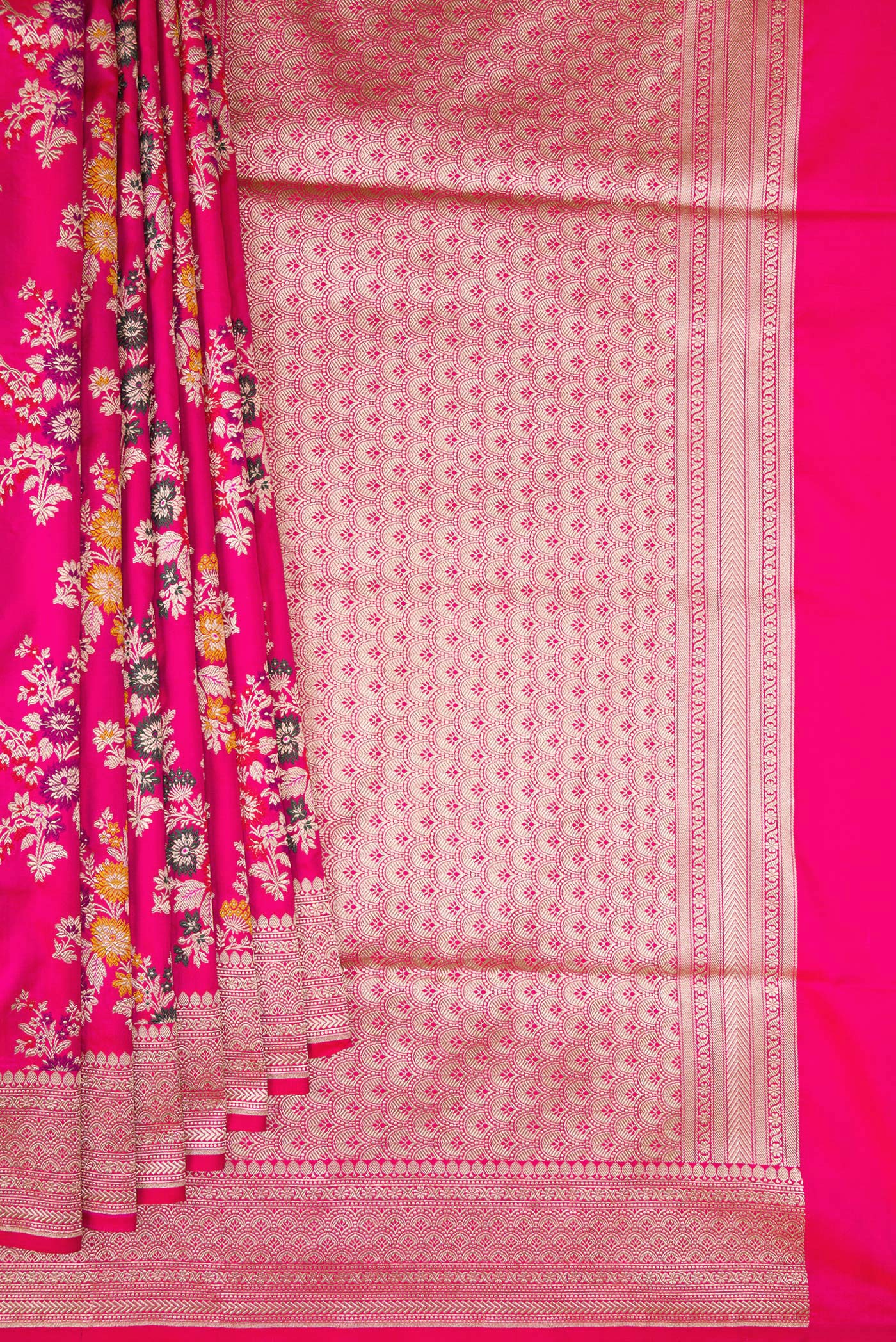 Pleats and pallu of Dark Pink Banarasi Silk Saree with Zari Brocade on the body and Zari Border. 