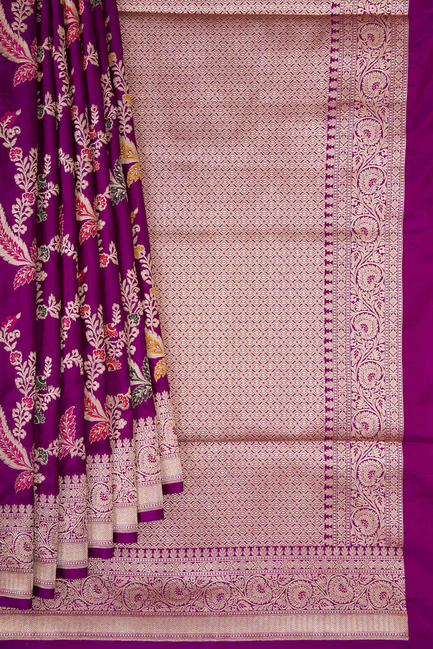 Pleats and pallu of Purple Banarasi Silk Saree with Zari Brocade on the body and Fancy Border. 