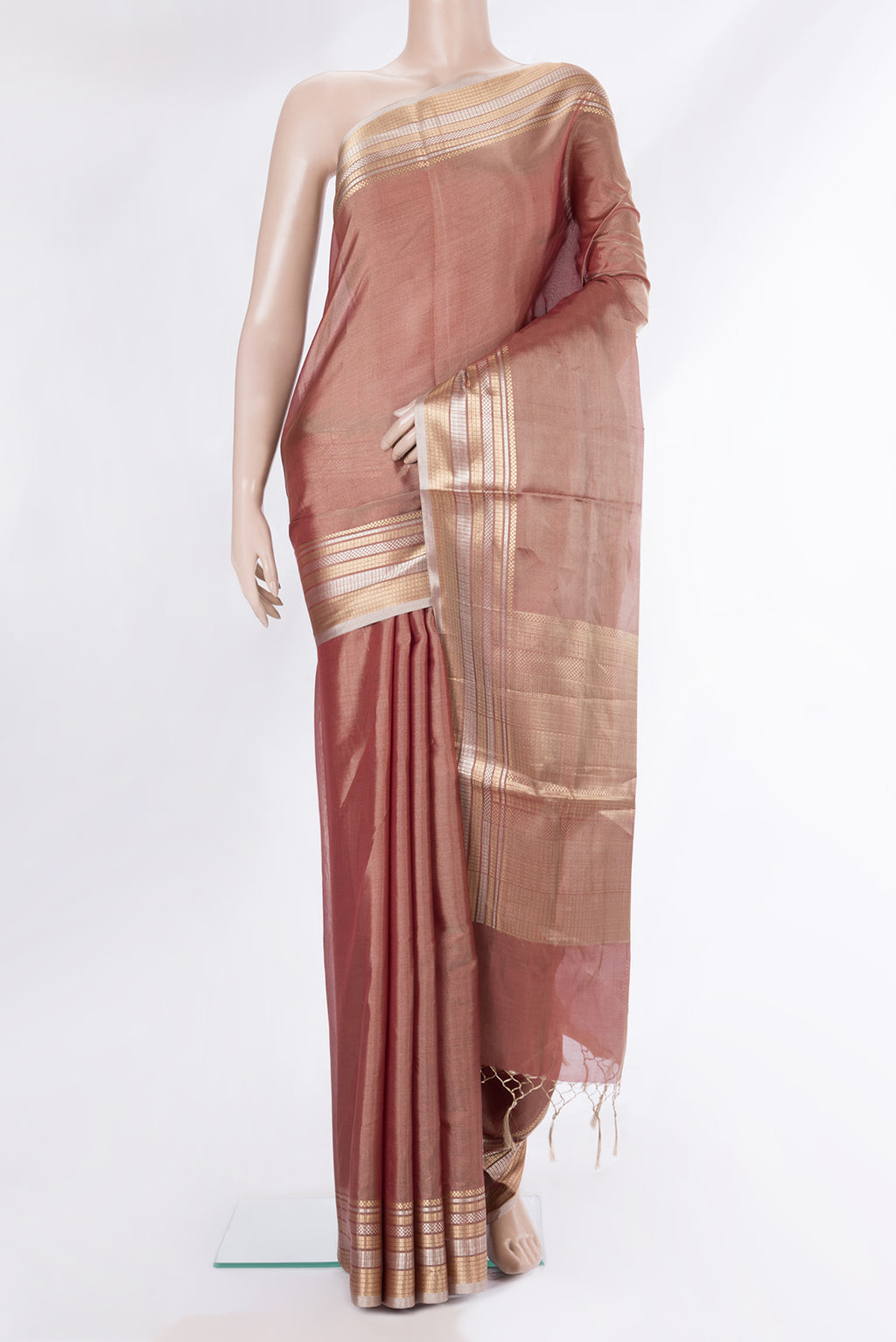 Rose Gold Dual Tone Organza Saree with Plain Body and Zari Border.  displayed on a mannequin