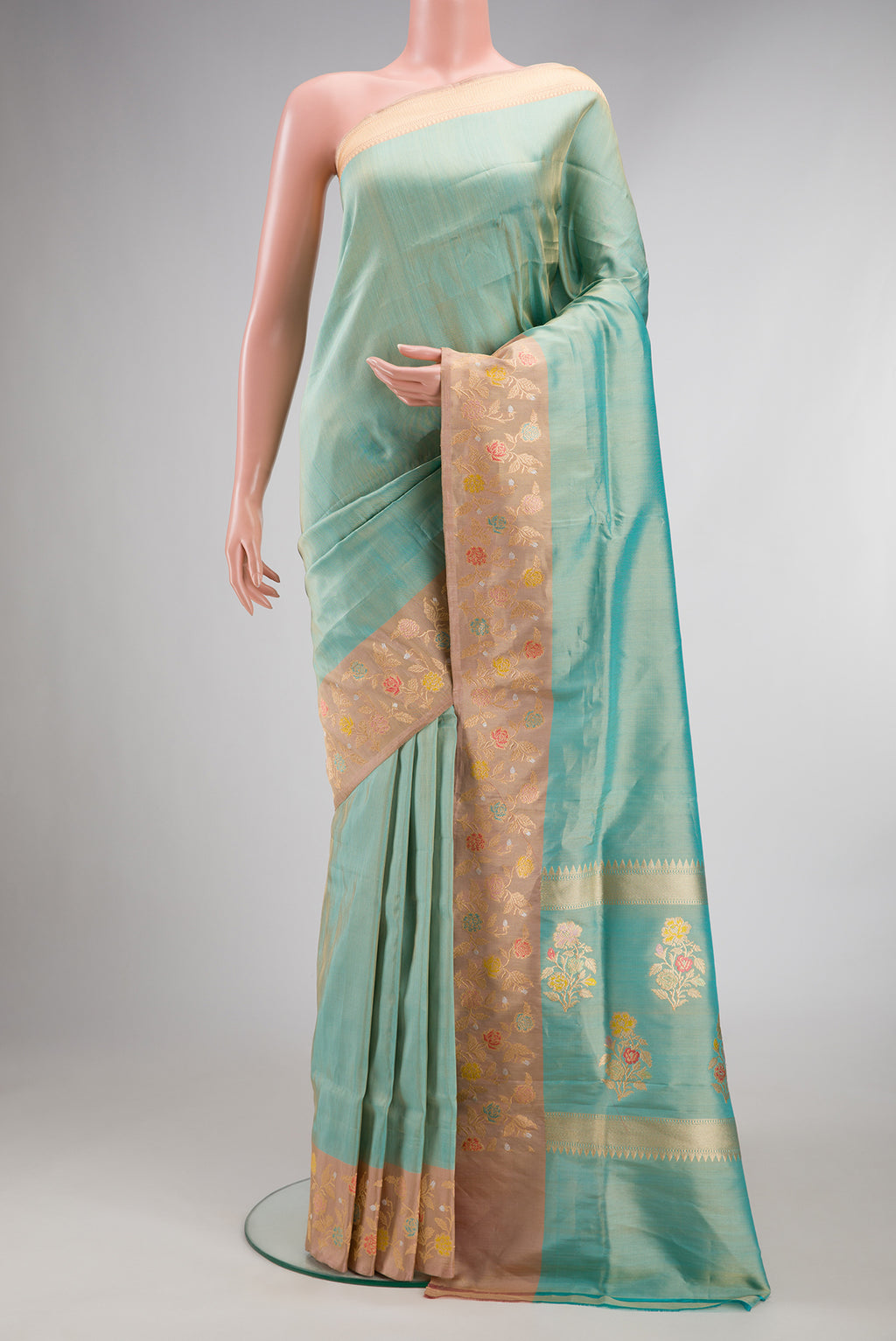 Sea Green Dual Tone Banarasi Tissue Saree with Plain Body and Fancy Border.  displayed on a mannequin