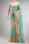 Sea Green Dual Tone Banarasi Tissue Saree with Plain Body and Fancy Border.  displayed on a mannequin
