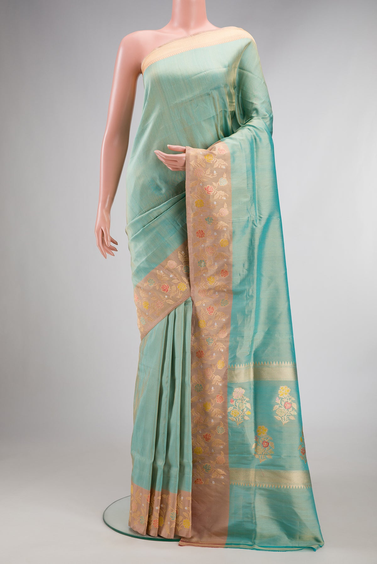 Sea Green Dual Tone Banarasi Tissue Saree with Plain Body and Fancy Border.  displayed on a mannequin