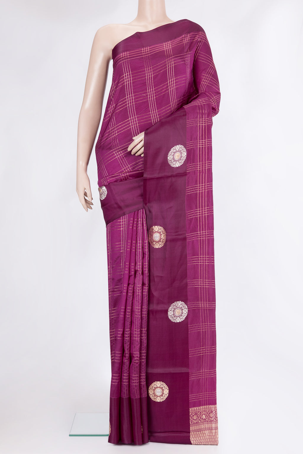 Purple Tussar Silk Saree with Checked design on the body and Fancy Border.  displayed on a mannequin