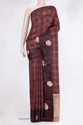 Coffee Brown Tussar Silk Saree with Checked design on the body and Fancy Border.  displayed on a mannequin