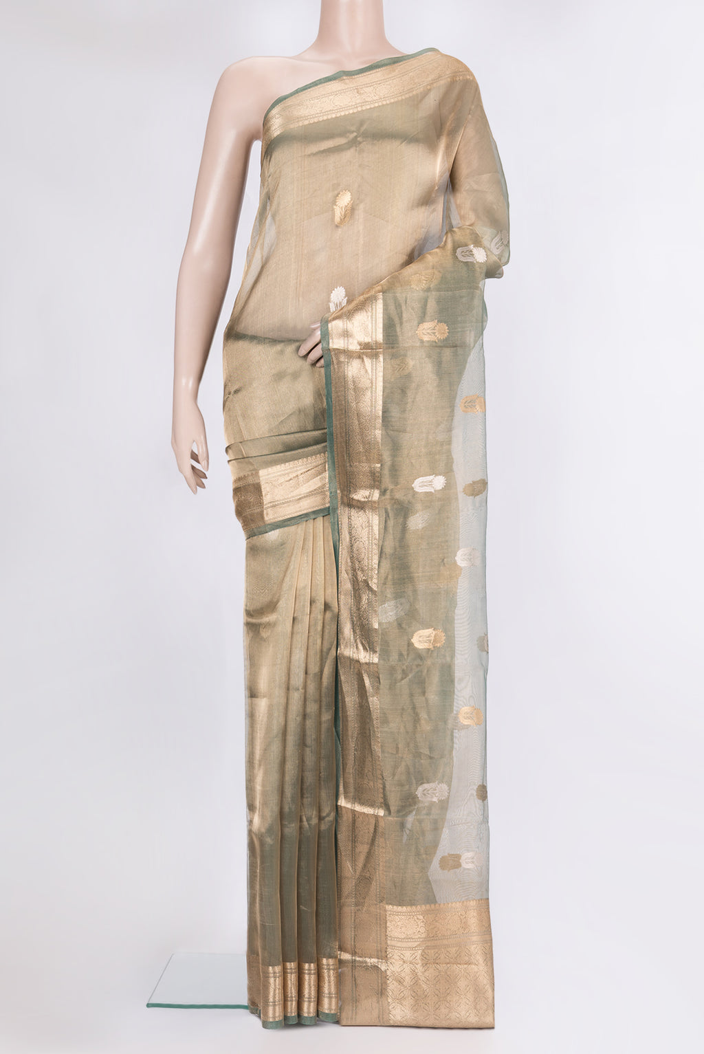 Green Dual Tone Organza Saree with Zari Butta on the body and Zari Border.  displayed on a mannequin