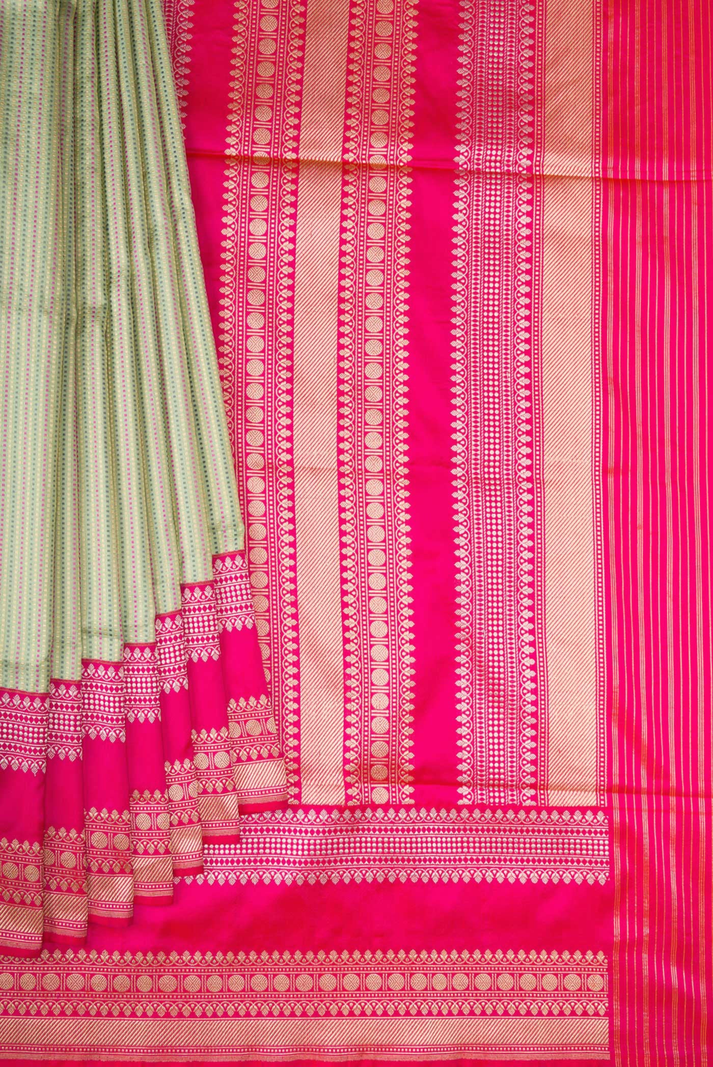 Pleats and pallu of Pista Green Banarasi Silk Saree with Stripes on the body and Fancy Border. 