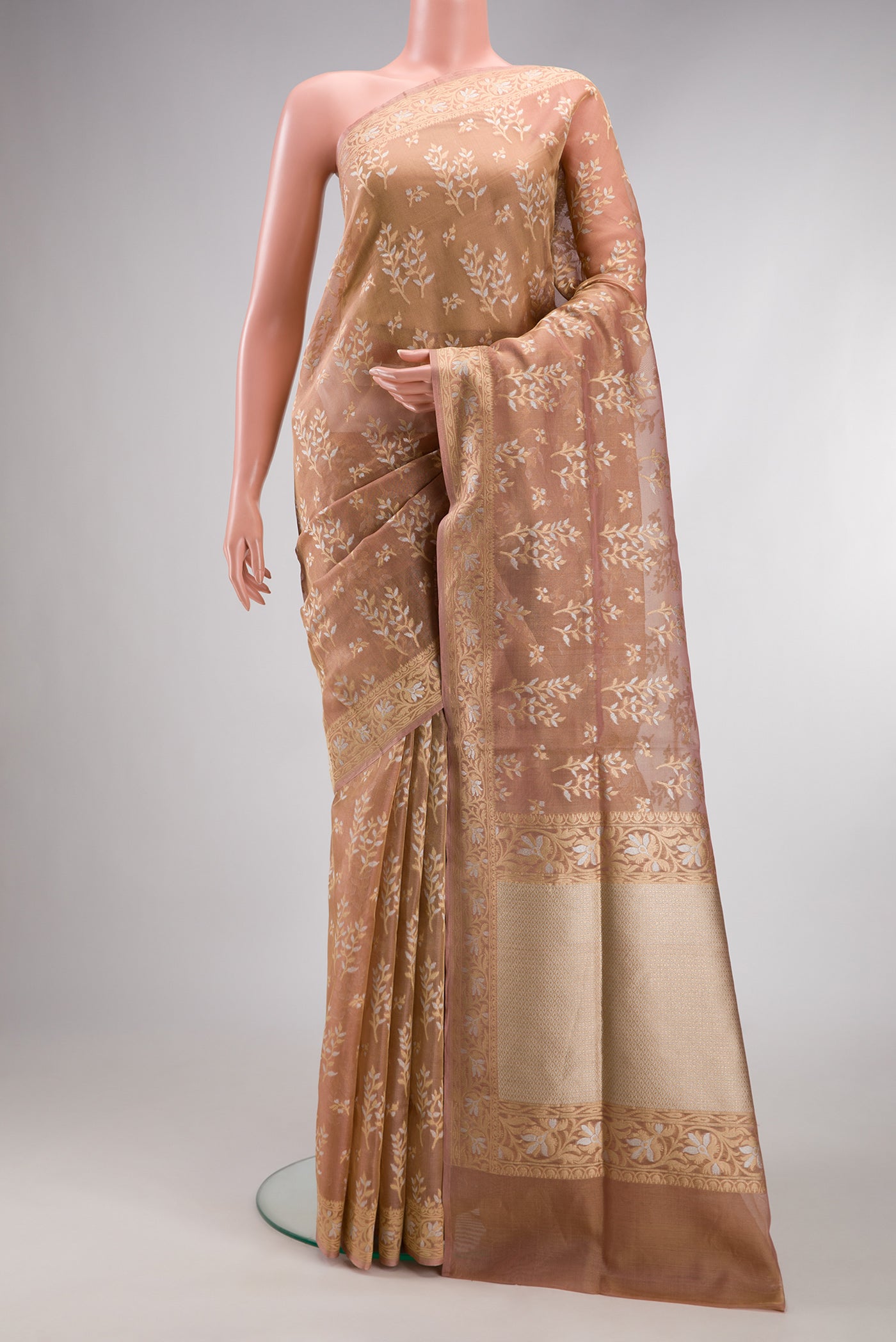 Rose Gold Dual Tone Banarasi Silk Saree with Zari Brocade on the body and Fancy Border.  displayed on a mannequin