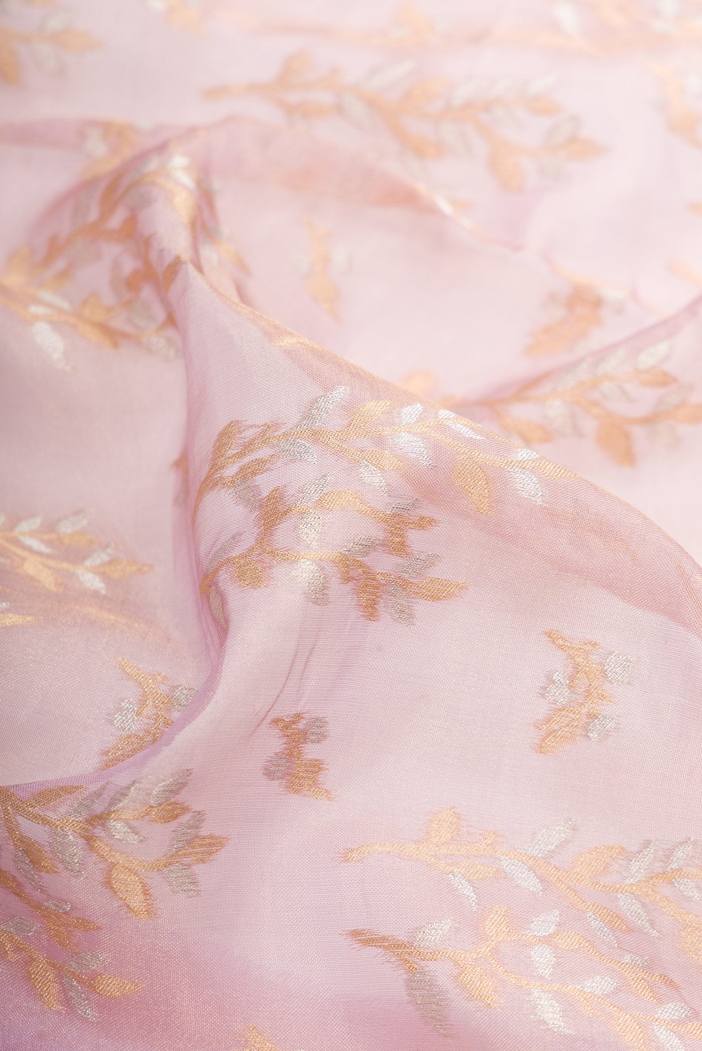 Close up of Lavender Dual Tone Banarasi Silk Saree with Zari Brocade on the body and Fancy Border.  displaying folds